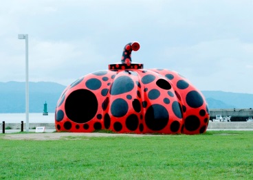 Red Pumpkin ©Yayoi Kusama,  2006 Naoshima Miyanoura Port Square, Photo courtesy of Daisuke Aochi